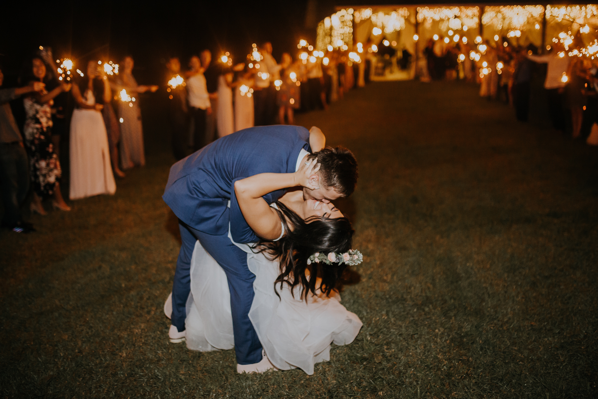 sparkler exit | wedding sparkler exit | romantic sparkler exit | outdoor Florida wedding | sarasota wedding | last kiss | dip and kiss